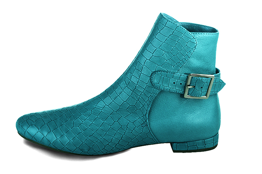 Turquoise blue women's ankle boots with buckles at the back. Round toe. Flat block heels. Profile view - Florence KOOIJMAN
